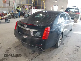 2014 Cadillac CTS Luxury AWD with VIN 1G6AX5S31E0143179, listed as a IAAI auction lot 41421639 with 135,810 mi miles and . Bid and sale history available at DreamBid. Image 4.