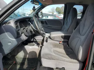 1999 Dodge Dakota SLT with VIN 1B7GG22Y5XS107729, listed as a Copart auction lot 79440034 with 163,718 mi miles and Salvage Title. Bid and sale history available at DreamBid. Image 7.