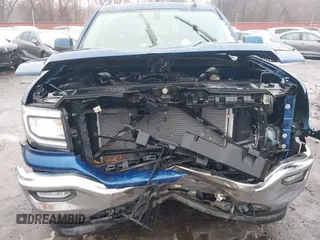 2017 GMC Sierra 1500 SLE z VIN 1GTV2MEC4HZ214619, wystawiony jako IAAI lot #41522006 z przebiegiem 184 513 mil mil oraz . Historia ofert i sprzedaży dostępna na DreamBid. Obrazek 6.