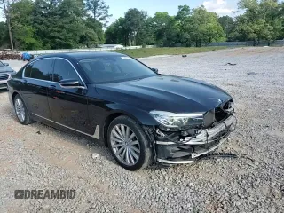 2017 BMW 7 Series 740i with VIN WBA7E2C57HG739482, listed as a Copart auction lot 53652145 with 102,418 mi miles and Salvage title. Bid and sale history available at DreamBid. Image 14.