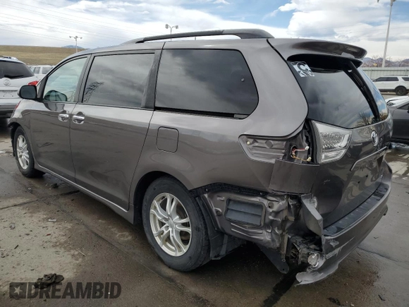 2014 Toyota Sienna SE with VIN 5TDXK3DC1ES445110, listed as a Copart auction lot 49928895 with 127,087 mi miles and Salvage Title. Bid and sale history available at DreamBid. Image 2.