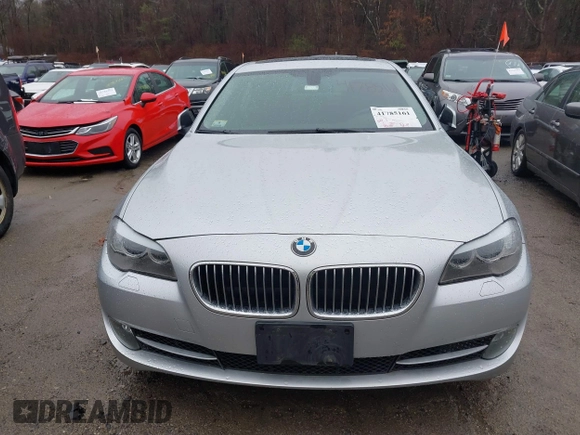 2013 BMW 5 Series 535i xDrive with VIN WBAFU7C56DDU66977, listed as a IAAI auction lot 41785161 with 88,919 mi miles and . Bid and sale history available at carsss.com. Image 6.