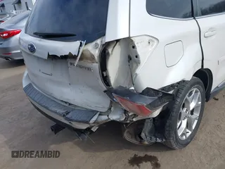 2018 Subaru Forester Touring z VIN JF2SJAWC0JH435392, wystawiony jako IAAI lot #41584762 z przebiegiem 92 151 mil mil oraz . Historia ofert i sprzedaży dostępna na DreamBid. Obrazek 6.