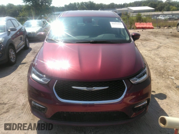 2023 Chrysler Pacifica Touring L with VIN 2C4RC1BG5PR505661, listed as a IAAI auction lot 42675532 with 8,525 mi miles and . Bid and sale history available at DreamBid. Image 12.