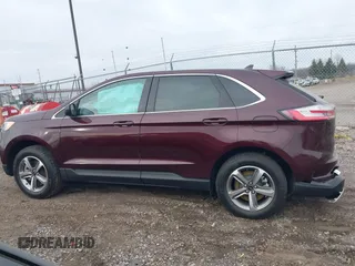 2024 Ford Edge SEL z VIN 2FMPK4J94RBA23897, wystawiony jako IAAI lot #41810930 z przebiegiem 7 110 mil mil oraz . Historia ofert i sprzedaży dostępna na DreamBid. Obrazek 14.