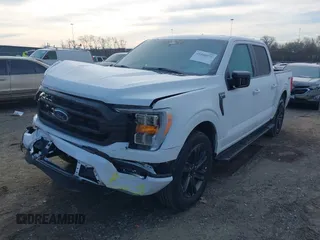 2023 Ford F-150 XL with VIN 1FTEW1C53PFB19119, listed as a IAAI auction lot 41580371 with 35,040 mi miles and . Bid and sale history available at DreamBid. Image 2.