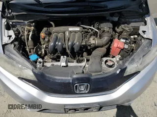 2016 Honda Fit EX z VIN JHMGK5H79GX001915, wystawiony jako Copart lot #58979205 z przebiegiem 135 871 mil mil oraz Szkoda całkowita • Salvage title. Historia ofert i sprzedaży dostępna na DreamBid. Obrazek 11.