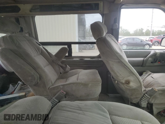 2000 GMC Safari z VIN 1GDDM19W3YB518506, wystawiony jako Copart lot #80923314 z przebiegiem 303 166 mil mil oraz Szkody całkowita. Historia ofert i sprzedaży dostępna na DreamBid. Obrazek 10.