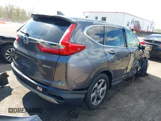 2017 Honda CR-V EX with VIN 2HKRW2H5XHH678674, listed as a IAAI auction lot 42039505 with 124,891 mi miles. Bid and sale history available at carsss.com. Image 4.