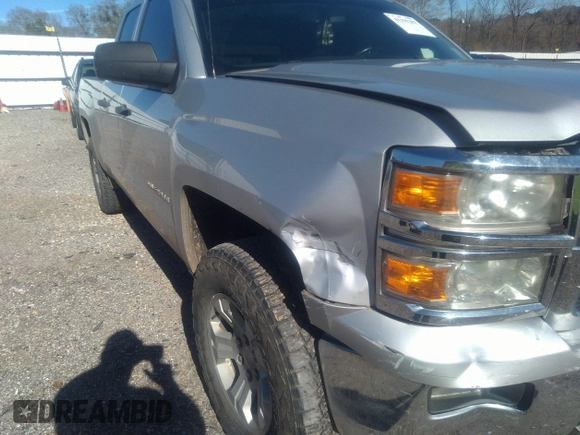 2014 Chevrolet Silverado 1500 LT with VIN 1GCVKREC7EZ120159, listed as a IAAI auction lot 41191282 with 206,836 mi miles and . Bid and sale history available at DreamBid. Image 17.