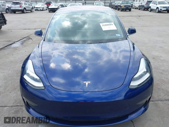 2019 Tesla Model 3 Mid Range with VIN 5YJ3E1EA5KF190453, listed as a IAAI auction lot 41880684 with 58,909 mi miles and . Bid and sale history available at carsss.com. Image 13.