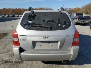 2005 Hyundai Tucson GL with VIN KM8JM12B95U067091, listed as a Copart auction lot 79297524 with 0 mi miles and Salvage Title. Bid and sale history available at carsss.com. Image 6.