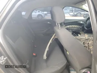 2016 Ford Focus SE z VIN 1FADP3F2XGL253736, wystawiony jako Copart lot #51758415 z przebiegiem 137 904 mil mil oraz Szkoda całkowita • Salvage title. Historia ofert i sprzedaży dostępna na DreamBid. Obrazek 10.
