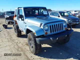 2012 Jeep Wrangler Arctic z VIN 1C4AJWBG9CL148519, wystawiony jako IAAI lot #41723700 z przebiegiem 42 044 mil mil oraz . Historia ofert i sprzedaży dostępna na DreamBid. Obrazek 1.