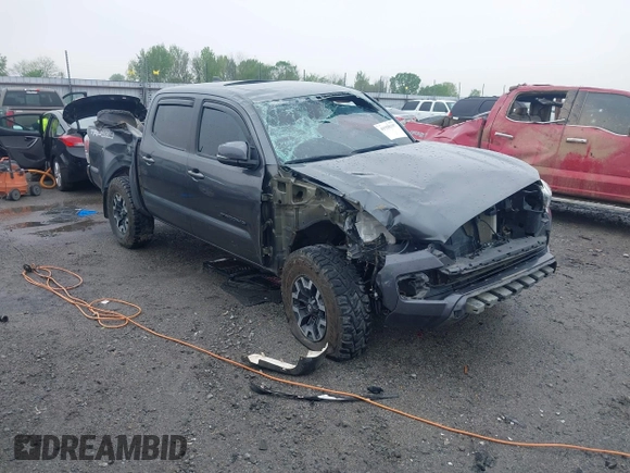 2022 Toyota Tacoma SR with VIN 3TMCZ5AN1NM476353, listed as a IAAI auction lot 41938107 with 51,782 mi miles and . Bid and sale history available at DreamBid. Image 1.