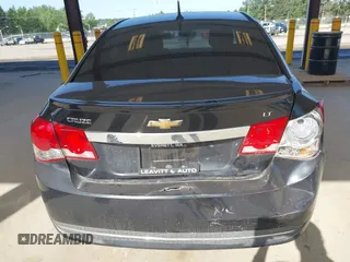 2014 Chevrolet Cruze 2LT z VIN 1G1PE5SB6E7260163, wystawiony jako IAAI lot #42182669 z przebiegiem 154 429 mil mil oraz . Historia ofert i sprzedaży dostępna na DreamBid. Obrazek 6.