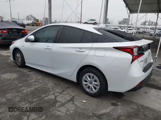 2021 Toyota Prius L Eco with VIN JTDKAMFU6M3150707, listed as a IAAI auction lot 41867272 with 55,499 mi miles and . Bid and sale history available at DreamBid. Image 3.