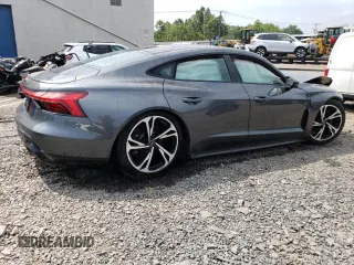 2022 Audi e-tron GT Premium Plus z VIN WAUCJBFW5N7004381, wystawiony jako Copart lot #63516494 z przebiegiem Nie podano mil oraz Szkody całkowita. Historia ofert i sprzedaży dostępna na DreamBid. Obrazek 3.