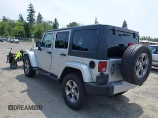 2012 Jeep Wrangler Unlimited Altitude with VIN 1C4HJWEG2CL140059, listed as a IAAI auction lot 42433563 with 189,868 mi miles and . Bid and sale history available at DreamBid. Image 3.