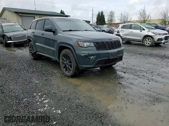 2018 Jeep Grand Cherokee Altitude with VIN 1C4RJFAG5JC219944, listed as a Copart auction lot 52030365 with 99,463 mi miles and Salvage title. Bid and sale history available at DreamBid. Image 11.