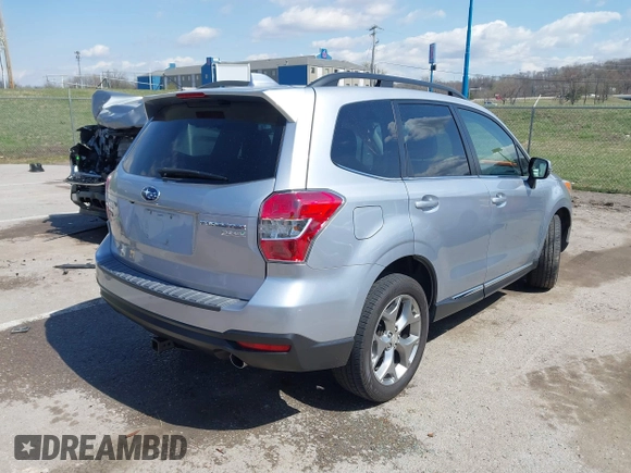 2016 Subaru Forester 2.5i Touring with VIN JF2SJAVC8GH493549, listed as a IAAI auction lot 41875775 with 74,767 mi miles. Bid and sale history available at carsss.com. Image 4.