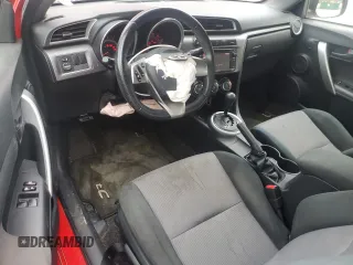 2014 Scion tC z VIN JTKJF5C79E3079305, wystawiony jako Copart lot #51750825 z przebiegiem 175 801 mil mil oraz Szkoda całkowita • Salvage title. Historia ofert i sprzedaży dostępna na DreamBid. Obrazek 8.