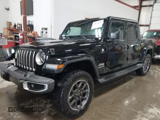 2020 Jeep Gladiator Overland with VIN 1C6HJTFG0LL182931, listed as a IAAI auction lot 41734803 with 75,525 mi miles and . Bid and sale history available at DreamBid. Image 2.