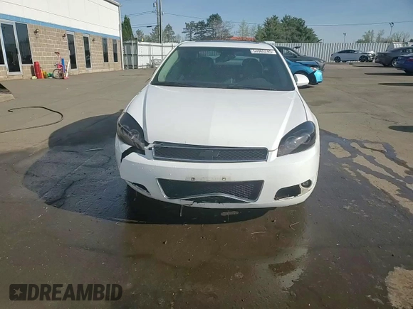 2013 Chevrolet Impala LTZ with VIN 2G1WC5E35D1173047, listed as a Copart auction lot 54965245 with 135,115 mi miles and Salvage Title. Bid and sale history available at DreamBid. Image 13.