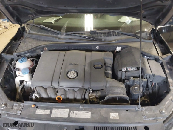 2013 Volkswagen Passat SEL Premium with VIN 1VWCP7A37DC068954, listed as a IAAI auction lot 42019750 with 127,943 mi miles. Bid and sale history available at carsss.com. Image 10.