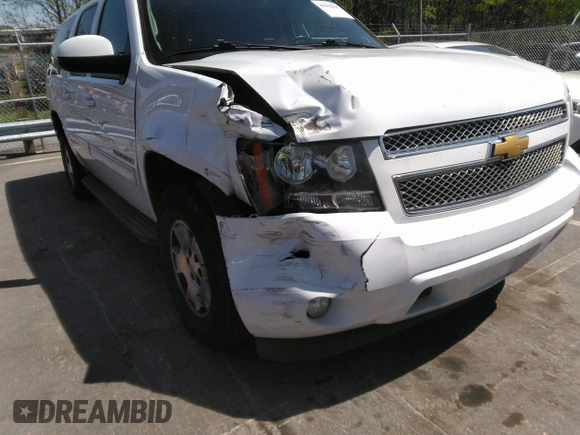 2014 Chevrolet Suburban LT with VIN 1GNSCJE05ER117663, listed as a IAAI auction lot 41992835 with 208,754 mi miles. Bid and sale history available at carsss.com. Image 6.
