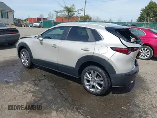2022 Mazda CX-30 S Select with VIN 3MVDMBBL4NM401563, listed as a IAAI auction lot 41826878 with 4,733 mi miles and . Bid and sale history available at carsss.com. Image 3.