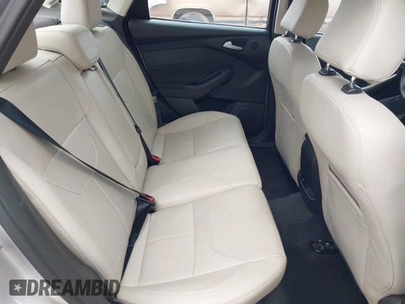 2017 Ford Focus Titanium with VIN 1FADP3J24HL229702, listed as a IAAI auction lot 42057013 with 120,250 mi miles and . Bid and sale history available at DreamBid. Image 8.