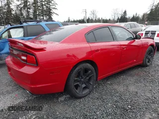 2012 Dodge Charger SXT with VIN 2C3CDXHG9CH129192, listed as a IAAI auction lot 41156443 with 179,959 mi miles. Bid and sale history available at carsss.com. Image 4.