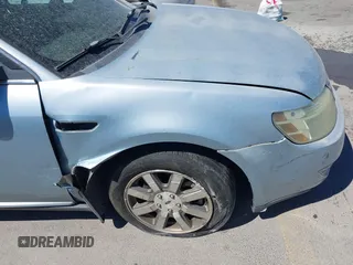 2008 Ford Taurus SEL with VIN 1FAHP24W08G174586, listed as a IAAI auction lot 41853617 with 122,016 mi miles and . Bid and sale history available at DreamBid. Image 6.