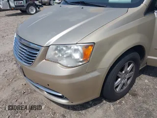 2011 Chrysler Town & Country Touring with VIN 2A4RR5DGXBR613179, listed as a IAAI auction lot 42143355 with 180,906 mi miles and . Bid and sale history available at DreamBid. Image 6.