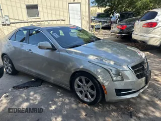 2015 Cadillac ATS Luxury RWD z VIN 1G6AB5RX9F0103005, wystawiony jako Copart lot #79092024 z przebiegiem 70 887 mil mil oraz Czysty tytuł • Clean title. Historia ofert i sprzedaży dostępna na DreamBid. Obrazek 1.
