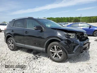 2018 Toyota RAV4 XLE with VIN 2T3WFREV2JW458816, listed as a Copart auction lot 53235105 with 135,469 mi miles and Salvage Title. Bid and sale history available at DreamBid. Image 4.