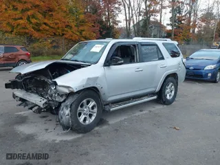 2016 Toyota 4Runner Limited with VIN JTEBU5JRXG5282857, listed as a IAAI auction lot 40674274 with 157,447 mi miles. Bid and sale history available at carsss.com. Image 2.