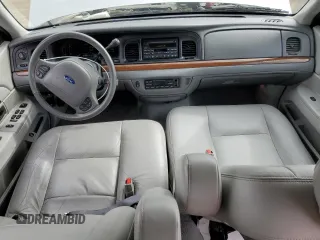 2004 Ford Crown Victoria LX с VIN 2FAHP74W04X168238, выставлен на аукционе Copart как лот 50842995 с пробегом 63 313 миль миль и Списание • Salvage title. История ставок и продаж доступна на DreamBid. Изображение 8.