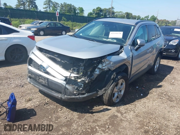 2019 Toyota RAV4 Hybrid LE with VIN 2T3MWRFVXKW031519, listed as a IAAI auction lot 42531170 with 68,160 mi miles and . Bid and sale history available at DreamBid. Image 2.
