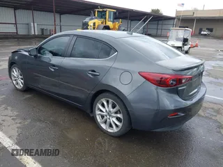 2014 Mazda 3 S Touring with VIN JM1BM1V31E1132448, listed as a IAAI auction lot 41815085 with 144,705 mi miles and . Bid and sale history available at DreamBid. Image 3.
