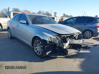 2014 Cadillac CTS Luxury RWD z VIN 1G6AR5S36E0181789, wystawiony jako IAAI lot #41769470 z przebiegiem 117 719 mil mil oraz . Historia ofert i sprzedaży dostępna na DreamBid. Obrazek 1.