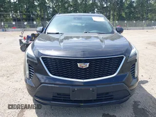 2019 Cadillac XT4 AWD Sport z VIN 1GYFZFR48KF119062, wystawiony jako IAAI lot #42449132 z przebiegiem 89 676 mil mil oraz . Historia ofert i sprzedaży dostępna na DreamBid. Obrazek 12.