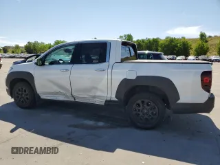 2023 Honda Ridgeline RTL-E with VIN 5FPYK3F76PB011963, listed as a Copart auction lot 63079165 with 25,658 mi miles and Salvage title. Bid and sale history available at DreamBid. Image 2.