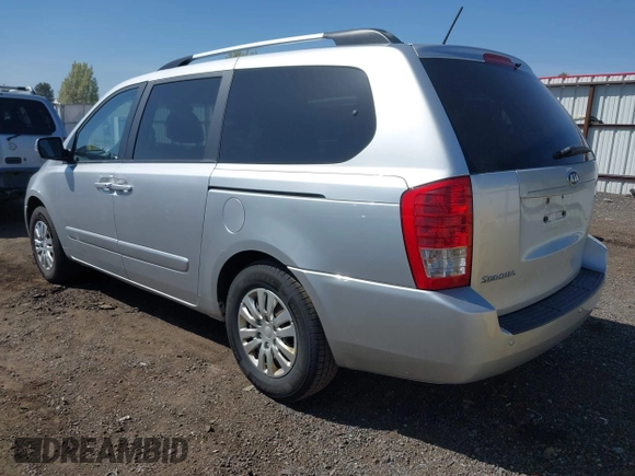 2012 Kia Sedona LX with VIN KNDMG4C70C6491703, listed as a IAAI auction lot 42128411 with 246,586 mi miles. Bid and sale history available at carsss.com. Image 3.