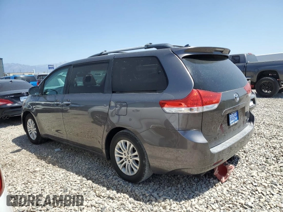 2011 Toyota Sienna XLE AAS with VIN 5TDYK3DCXBS134341, listed as a Copart auction lot 61602705 with 184,959 mi miles and Clean title. Bid and sale history available at DreamBid. Image 2.