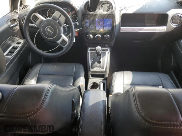 2017 Jeep Compass Latitude with VIN 1C4NJDEB9HD127855, listed as a Copart auction lot 56699735 with 119,046 mi miles and Salvage title. Bid and sale history available at DreamBid. Image 8.