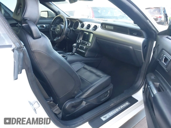 2021 Ford Mustang EcoBoost with VIN 1FATP8UH2M5120338, listed as a IAAI auction lot 40958016 with 76,979 mi miles. Bid and sale history available at carsss.com. Image 5.