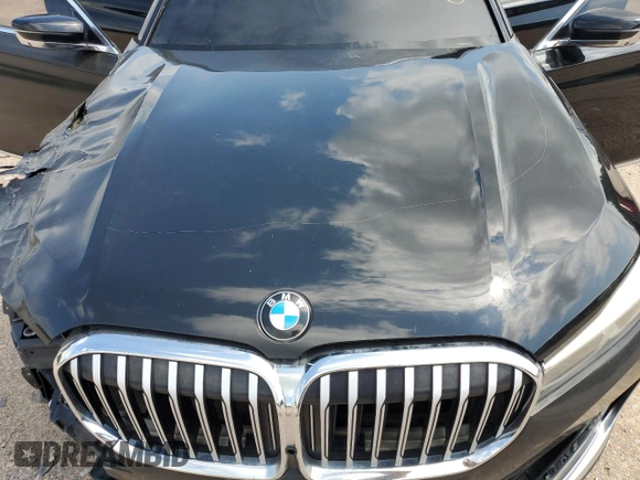 2020 BMW 7 Series 740i z VIN WBA7T2C06LGL17660, wystawiony jako Copart lot #57347885 z przebiegiem Nie podano mil oraz Tytuł czysty. Historia ofert i sprzedaży dostępna na DreamBid. Obrazek 11.