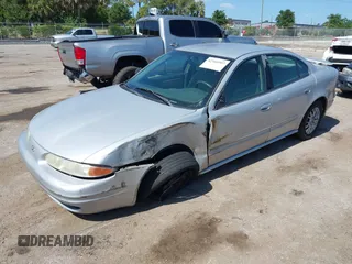 2004 Oldsmobile Alero GL1 z VIN 1G3NL52F54C206964, wystawiony jako IAAI lot #42160307 z przebiegiem 129 808 mil mil oraz . Historia ofert i sprzedaży dostępna na DreamBid. Obrazek 17.